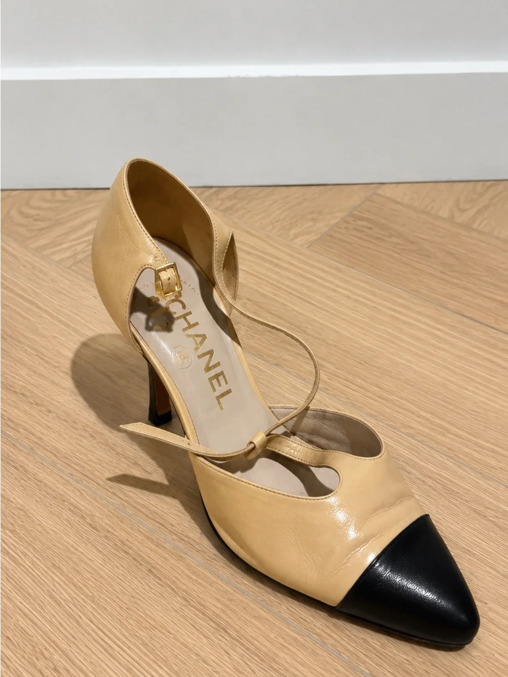 CHANEL Beige and Black Cap-Toe Slingback Heels